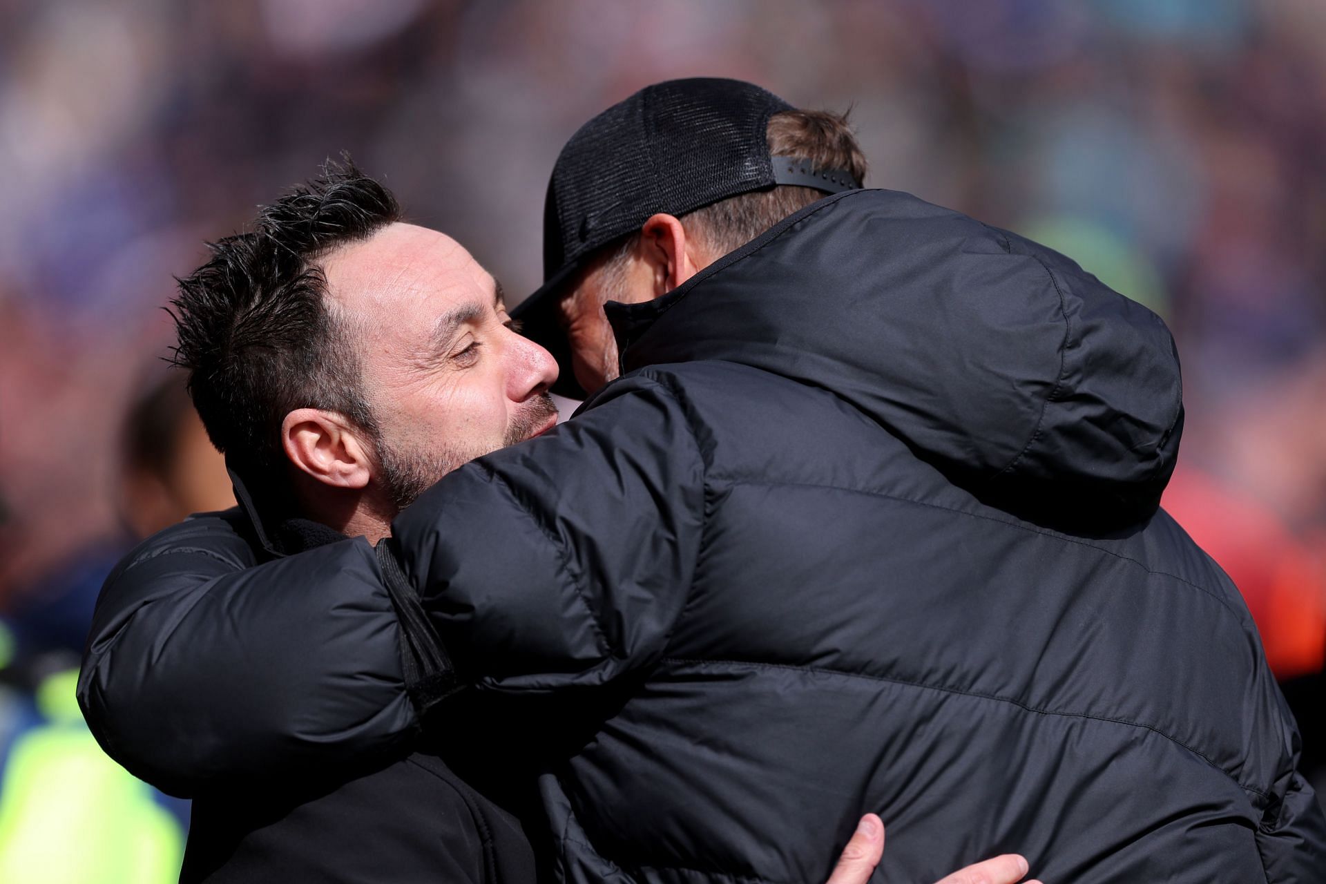Brighton boss De Zerbi (left) embraces his Liverpool counterpart Jurgen Klopp